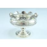 An early 20th Century miniature silver Monteith bowl, having scroll decorated rim, reeded sides