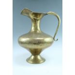 A large North African / Middle Eastern brass ewer, 50 cm