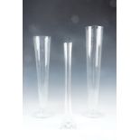 Three glass vases, tallest 50 cm