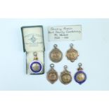 Five 1930s silver Kent Constabulary target shooting medals, P.C. Weskett, together with a