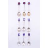 9 enamelled silver souvenir teaspoons, comprising three Red Cross teaspoons together with two