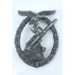 A German Third Reich Luftwaffe flak war badge by Assmann