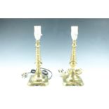 A pair of Victorian candlesticks converted to electricity, 32 cm