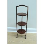 A 1920s mahogany folding cake stand, 88 cm