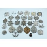 A quantity of Scottish and related cap badges etc