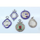 Four 1930s silver and enamel football fob medals, "Dauntless Amateur" and "Edmonton District"