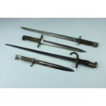 Four bayonets including a 1910 manufactured Pattern 1907 bayonet having had its quillon officially