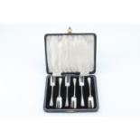 A cased set of silver Hanoverian cake forks, having shell terminals, Cooperative Wholesale Society