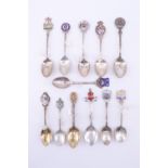 11 silver and enamelled silver souvenir teaspoons, including Torquay etc, together with a similar