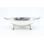 A George III influenced oval silver bowl, having Neoclassical edge moulding and horizontal pierced