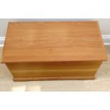 A quality contemporary pine bedding box with brass handles, 93 cm x 48 cm x 46 cm