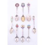 6 enamelled silver souvenir teaspoons , relating to countries and international cities including "