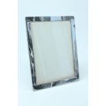 A 1920s silver faced photograph frame, 18 x 24 cm