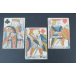 Three 18th Century printed and watercolour tinted playing card, having been used as labels and