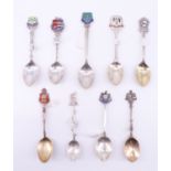 9 silver and enamelled silver souvenir teaspoons, relating to the Midlands including Oxford,