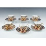 Six Royal Crown Derby Imari pattern cups and saucers, pattern 2451