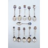 11 silver and enamelled silver souvenir teaspoons, relating to South East Scotland including