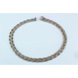 A near contemporary 925 standard white metal necklace of plaited fox-tail link chains set with small