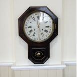 A late 19th Century American drop dial wall clock by Seth Thomas, having a painted face with outer