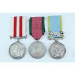 An Indian Mutiny Medal with Crimea and Turkish Crimea Medals, the former two impressed to Cpl W