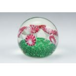 A glass flowerhead paperweight