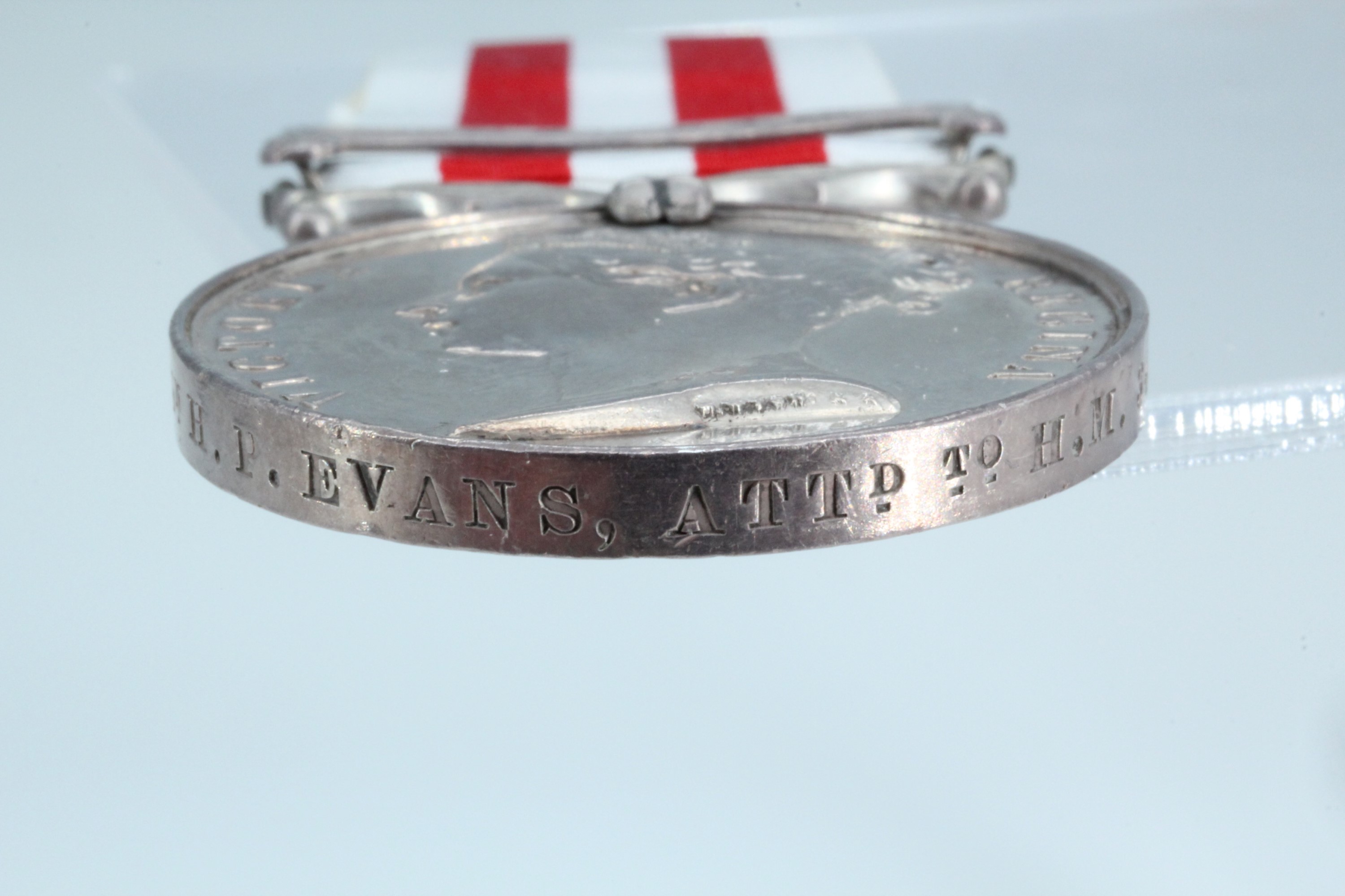 An Indian Mutiny medal with Lucknow clasp impressed to Ens H P Evans, Attd to H M 34th Regt - Image 4 of 5