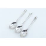 Three Walker and Hall golf related silver coffee spoons, the terminals having crossed golf clubs,