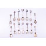 14 silver and enamelled silver souvenir teaspoons, relating to the North West including Liverpool,