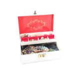A jewellery box containing a quantity of costume bead necklaces and brooches etc