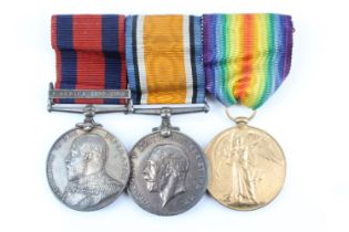 An Edward VII Transport Medal with South Africa 1899-1902 clasp, British War and Victory Medals to