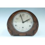 A 1940s - 1950s Anvil oak mantle clock, 24 cm x 21 cm