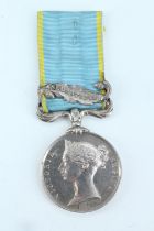 A Crimea Medal with single clasp un-named