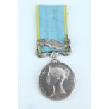 A Crimea Medal with single clasp un-named