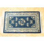 A Chinese wool pile rug, 160 x 95