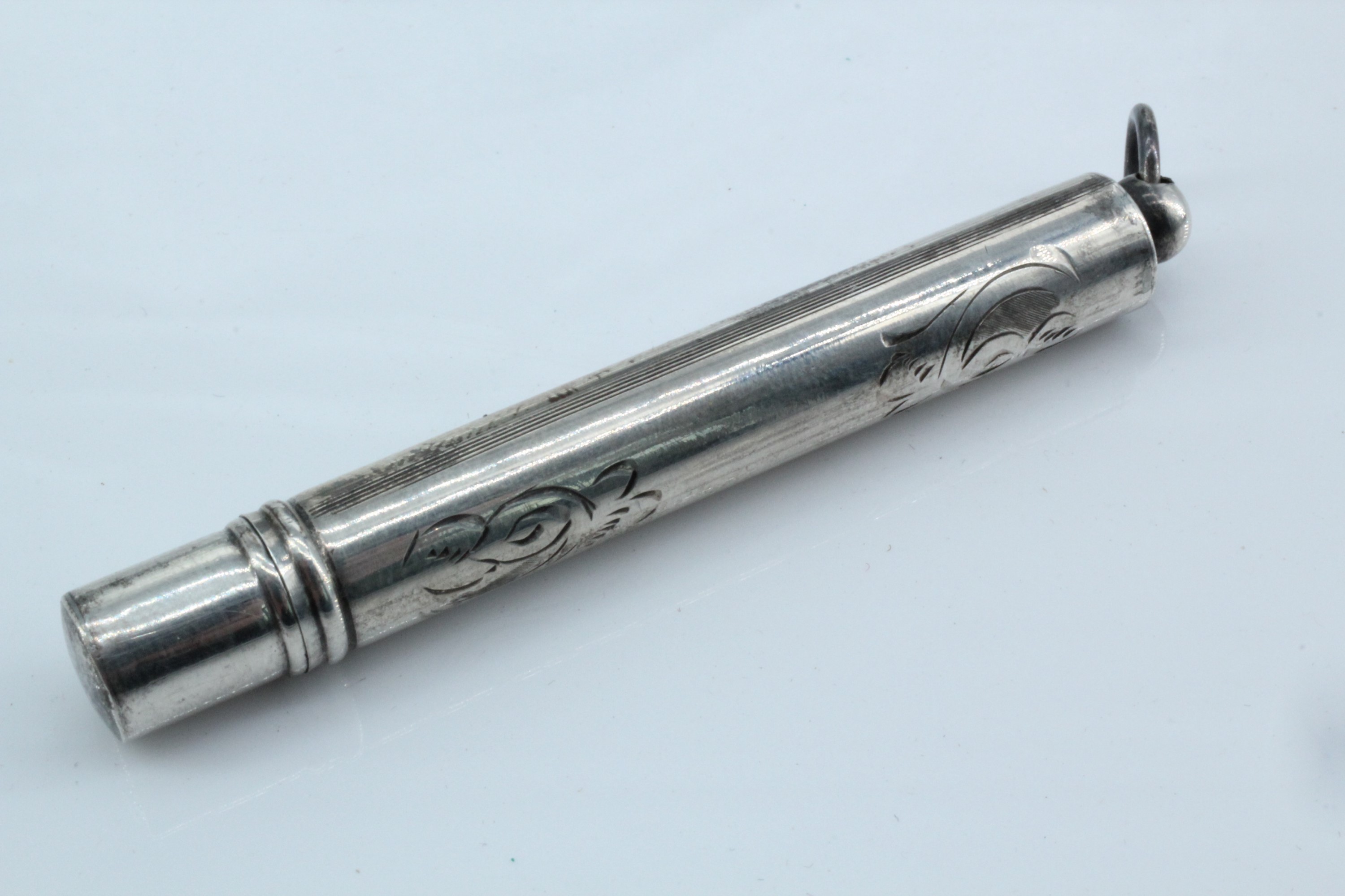 An early 20th Century engraved silver fob pencil holder, 6.5 cm
