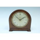 A mid-20th Century Smiths Art Deco influenced key-wound oak mantle clock, face 10 cm