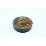 A 19th Century circular lacquered snuff box, having a hand coloured printed scene of gamblers, 2 x