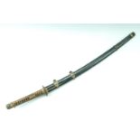 An Imperial Japanese navy officer's 1937 kai gunto sword, the blade tang marked, exhibiting a