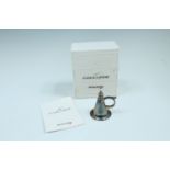 A boxed British Airways 'Concorde' electroplate candle snuffer