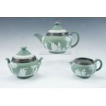 A late 19th Century Wedgwood electroplate mounted green Jasperware bachelor tea set