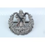 A Queen's Own Cameron Highlanders officer's white metal bonnet / cap badge, (tested as silver)