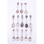 12 silver and one white metal souvenir teaspoons, first half 20th Century, 181 g