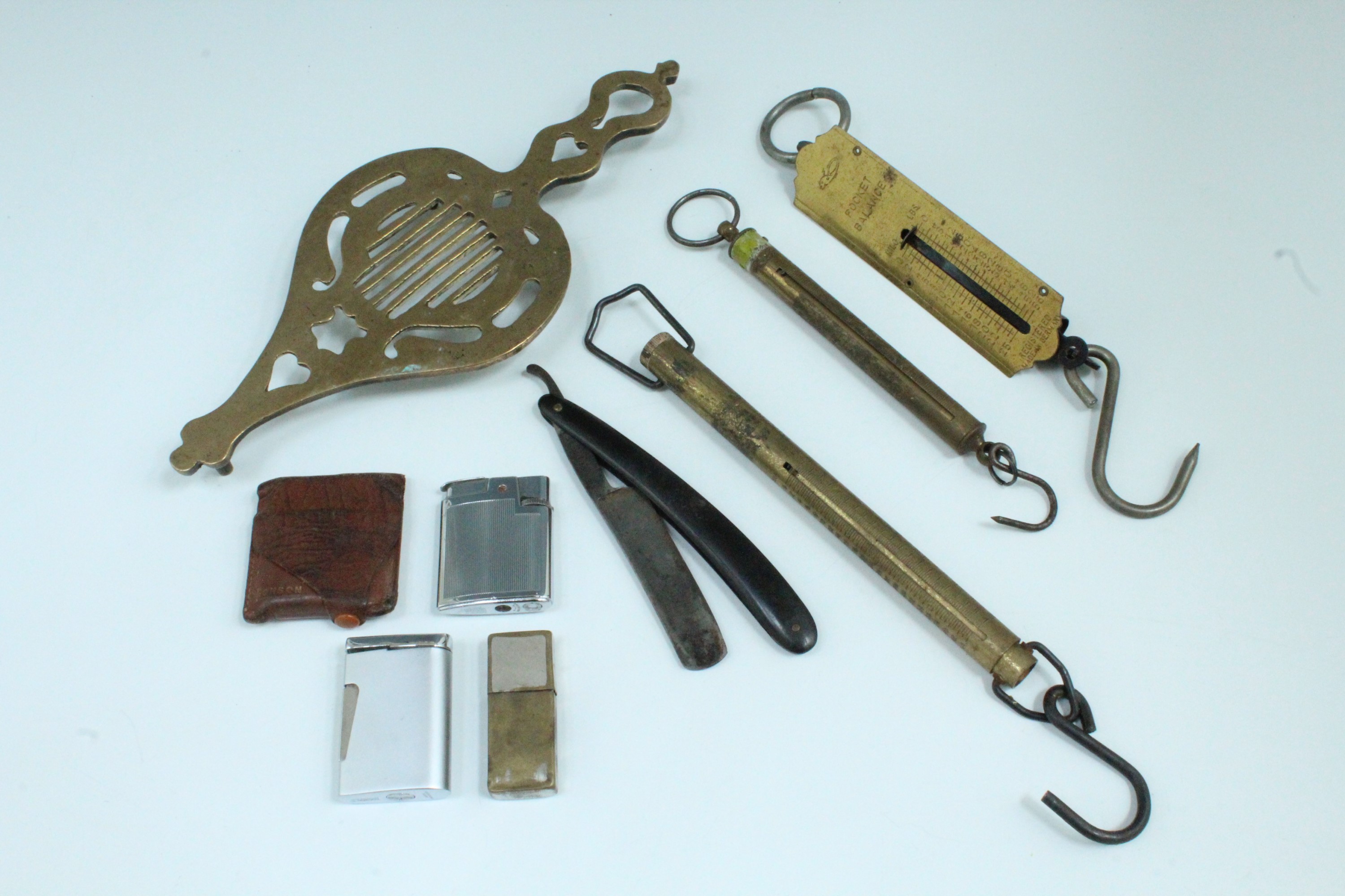 Sundry collectors' items including Ronson and other vintage lighters, a Hunnikin cutthroat razor,