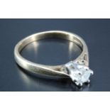 A diamond solitaire ring, the brilliant cut stone of approximately 0.25 ct platinum crown set