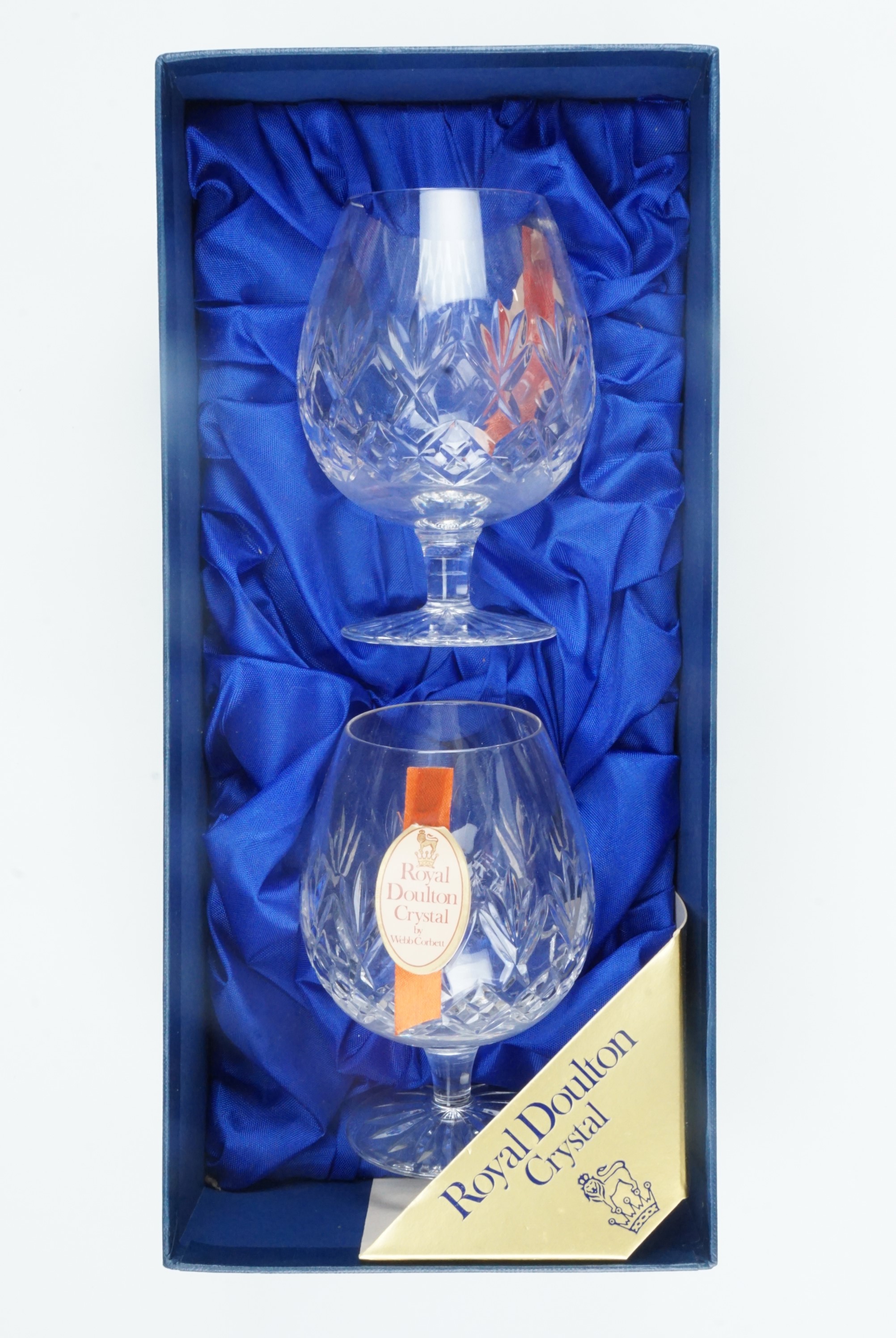 A boxed pair of Webb Corbett brandy balloons, late 20th Century, retailed by Royal Doulton, 12.5