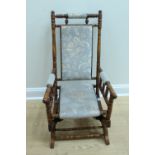 A late 19th Century American sprung rocking chair