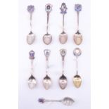 9 silver and enamelled silver souvenir teaspoons, relating to the South East including