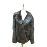 A vintage fur jacket, label size 42