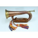 A brass and copper bugle