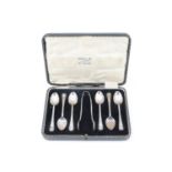 A cased set of silver old English teaspoons and tongs, having ribbon and reed decoration, Sheffield,